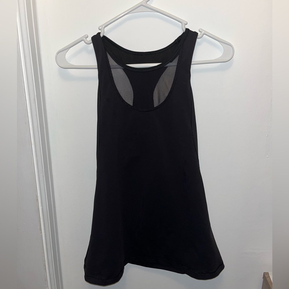Lululemon black racerback tank w/ mesh details and built in sports bra. Size 4